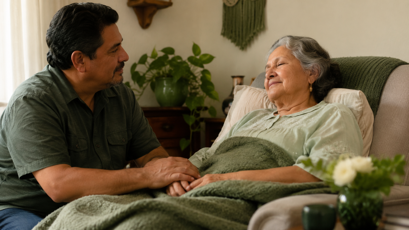 Loved one sitting beside a hospice patient resting peacefully, representing why hospice patients sleep more near the end of life
